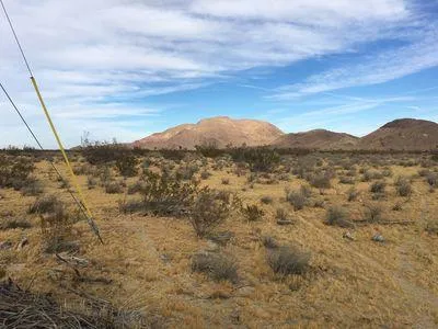 a view of mountains and valleys