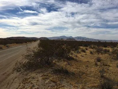 a view of mountain with lake view