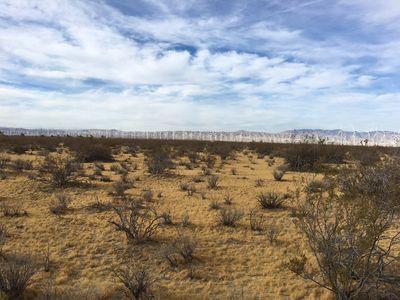 9990 West 55th Street Mojave, CA 93501 - Photo 3 of 18 a view of a lake with houses in city