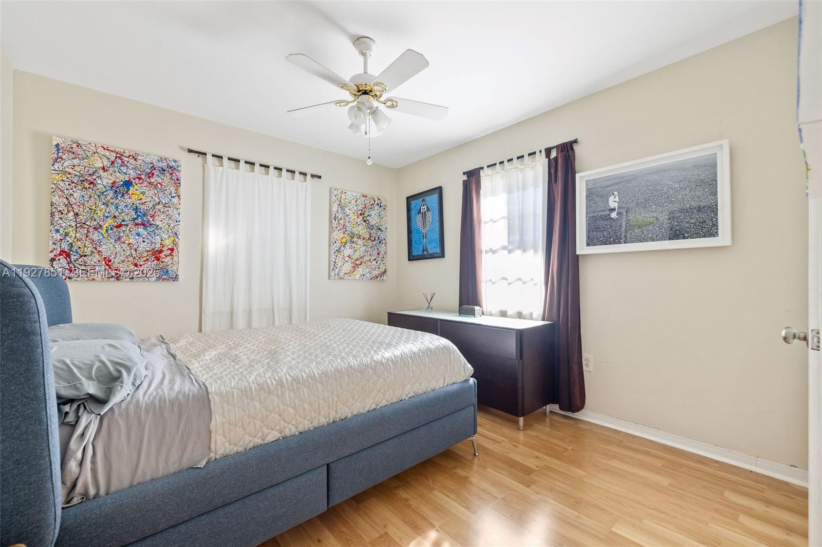 3310 Southwest 21st Street Miami, FL 33145 - Photo 12 of 20 a bedroom with a large bed and a window