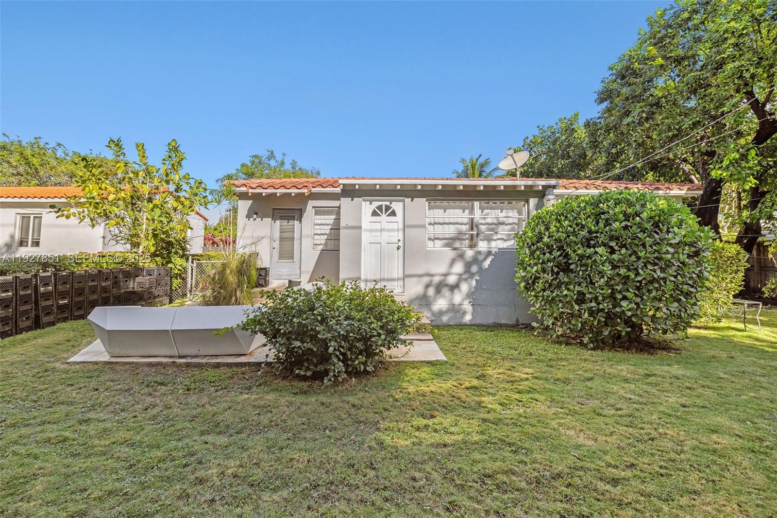 3310 Southwest 21st Street Miami, FL 33145 - Photo 20 of 20 a view of a garden with a fountain
