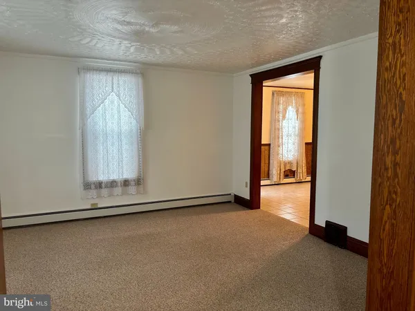 a view of a livingroom with a staircase