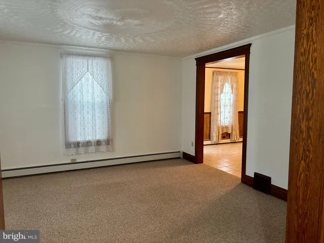 a view of a livingroom with a staircase