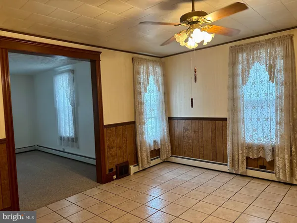 a view of a livingroom with wooden floor