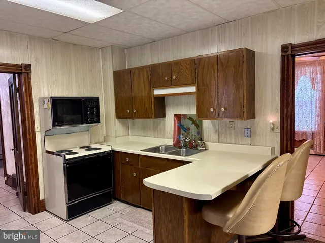 a room with furniture and a mirror