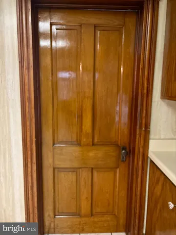 a bathroom with a shower and a toilet