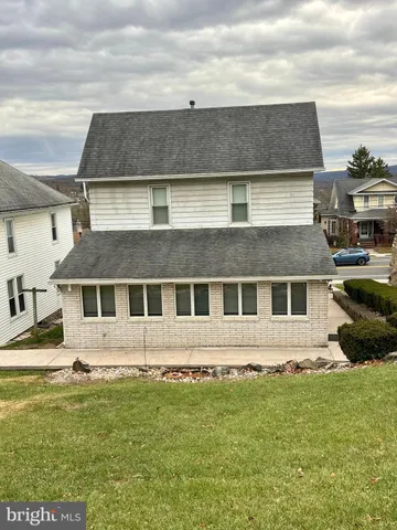 a view of a big yard with an outdoor space