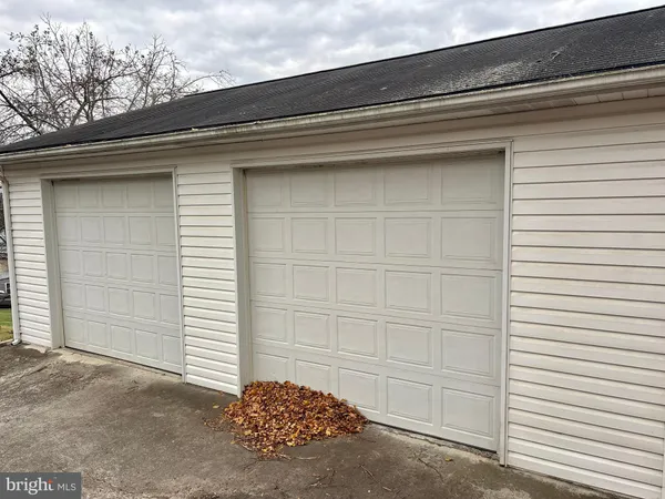 a view of a room with wooden walls