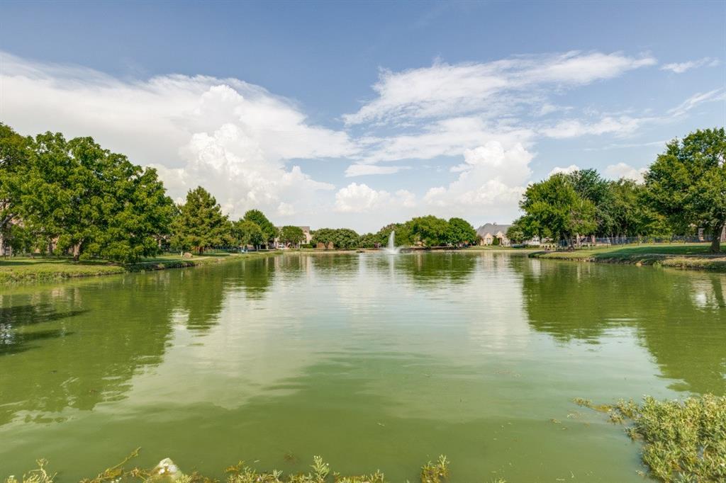 1721 Brookside Drive Prosper, TX 75078 - Photo 12 of 12 a view of a lake with a city view