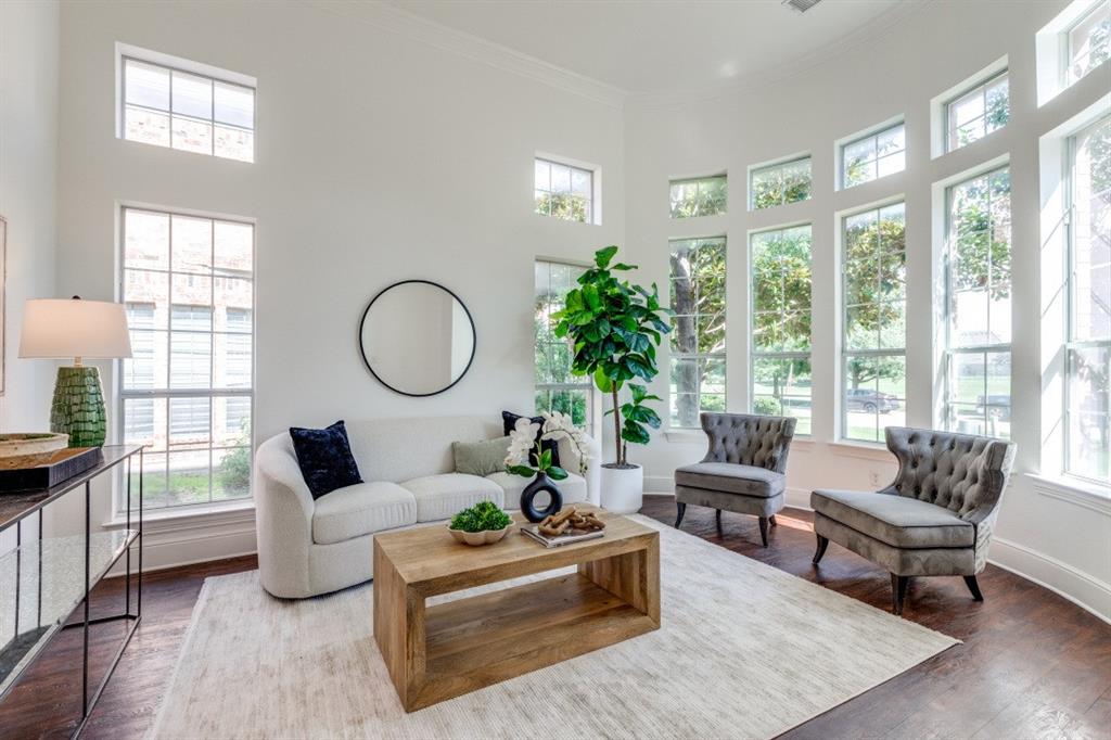 1721 Brookside Drive Prosper, TX 75078 - Photo 3 of 12 a living room with furniture and a large window