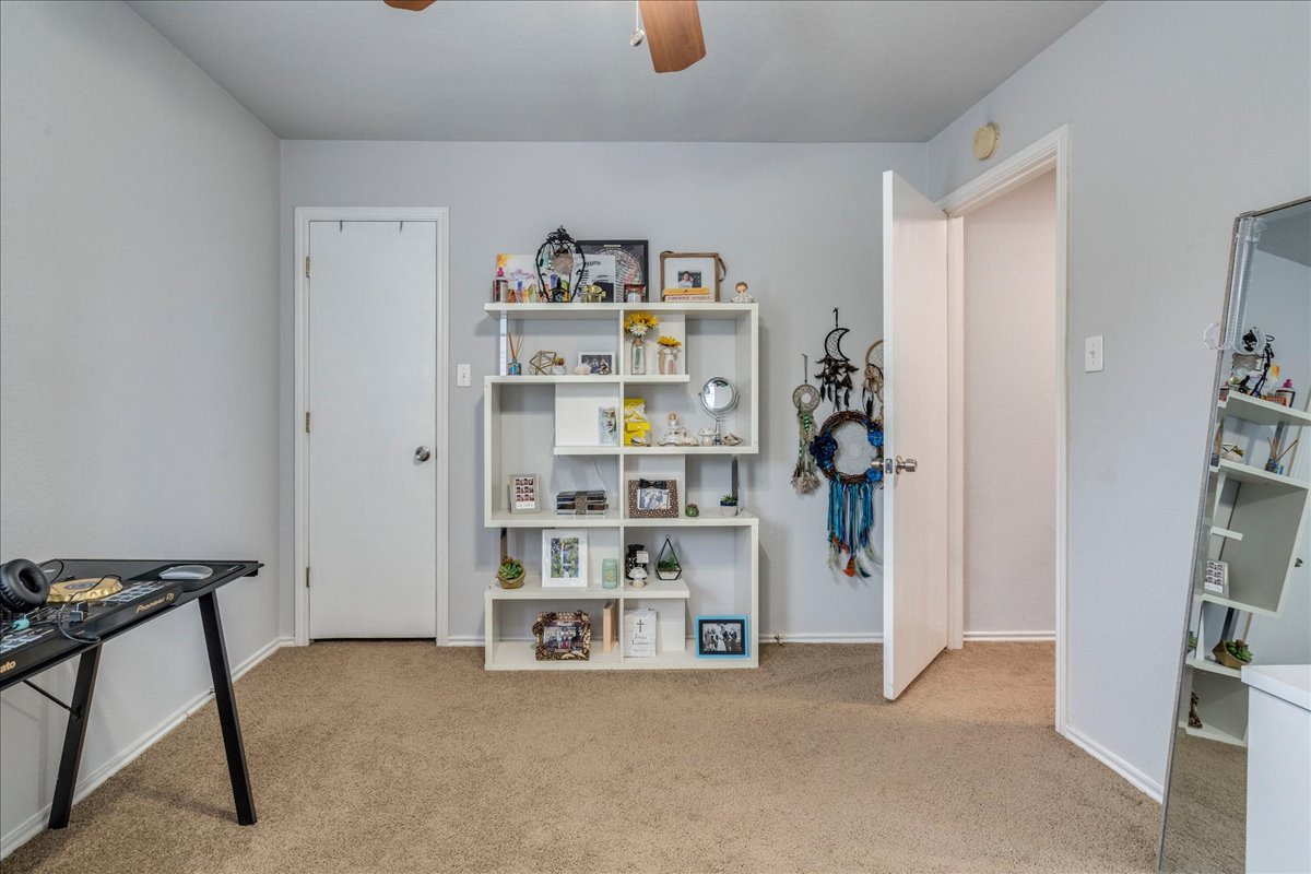 148 Buttercup Way Kyle, TX 78640 - Photo 22 of 30 a view of room with shelves