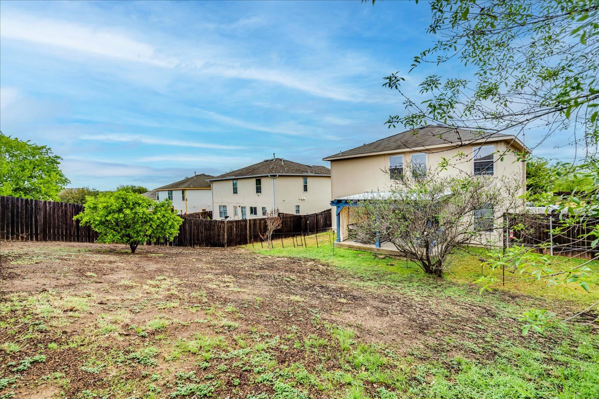 148 Buttercup Way Kyle, TX 78640 - Photo 30 of 30 front view of a house with a yard