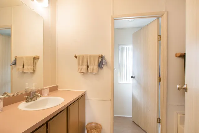 a bathroom with a tub and a shower