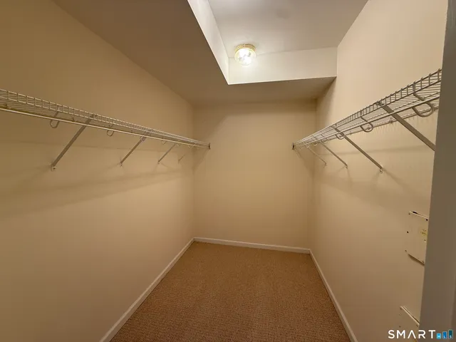 a view of a room with racks on the wall