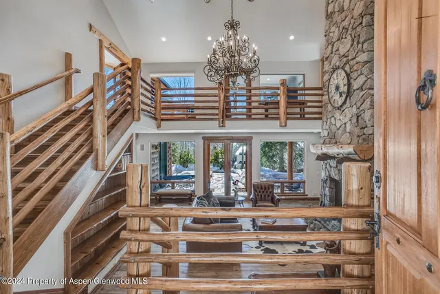 a view of a chairs and table in the patio