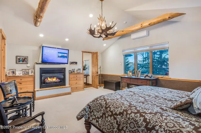 a view of swimming pool with a yard and wooden fence