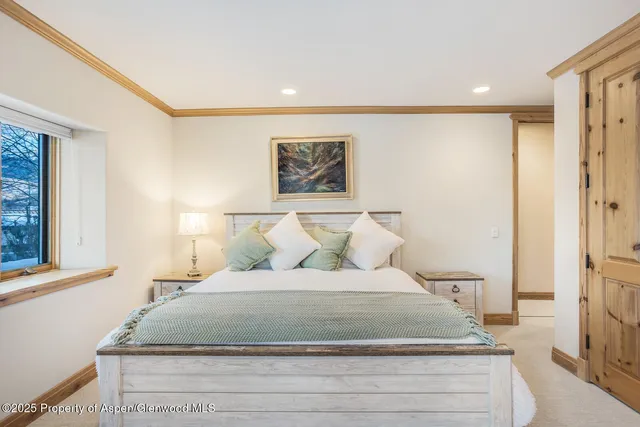 an aerial view of a house with a yard and a garden