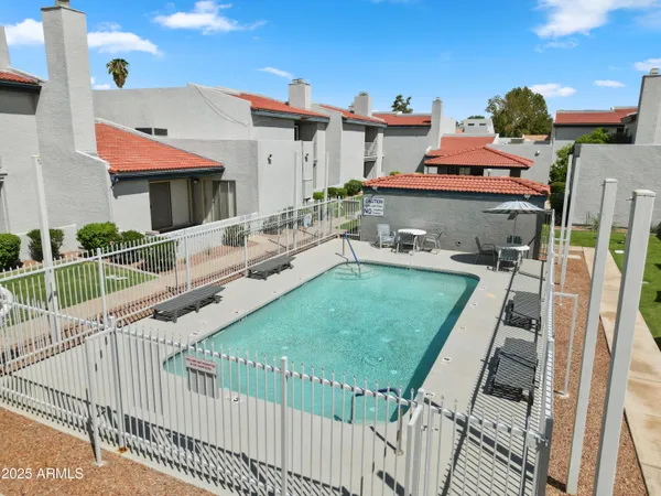 a house view with a backyard space