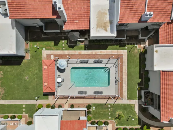 a store area with lots of different kinds of fruit and vegetables