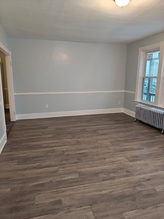 115 Maple Street, Unit 3 Gardner, MA 01440 - Photo 9 of 12 a view of a livingroom with wooden floor