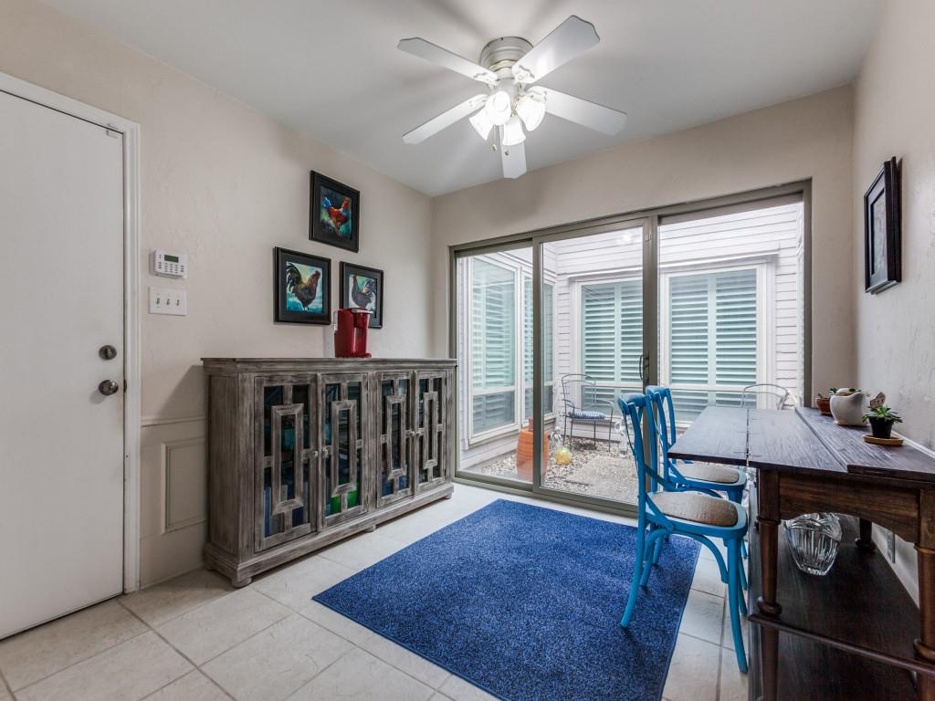 4020 Morman Lane Addison, TX 75001 - Photo 14 of 25 a living room with furniture and a window