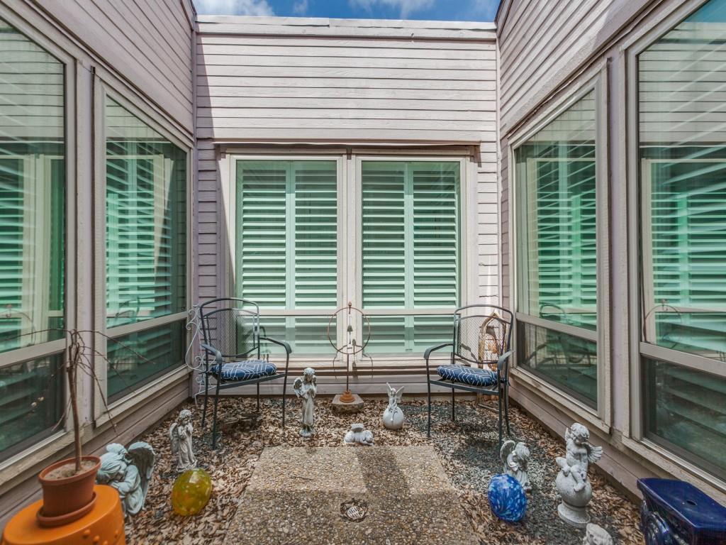 4020 Morman Lane Addison, TX 75001 - Photo 23 of 25 a backyard of a house with outdoor seating