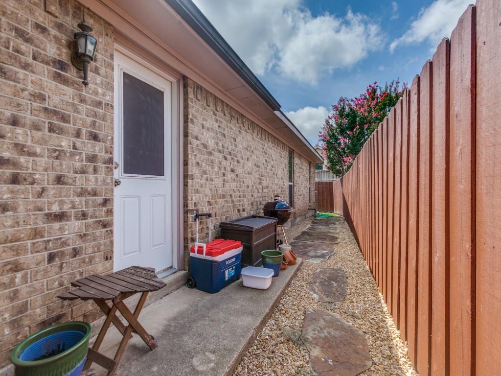 4020 Morman Lane Addison, TX 75001 - Photo 24 of 25 a backyard of a house with outdoor seating