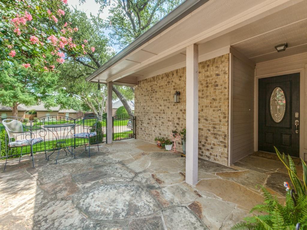 4020 Morman Lane Addison, TX 75001 - Photo 3 of 25 a view of a backyard with large trees and plants
