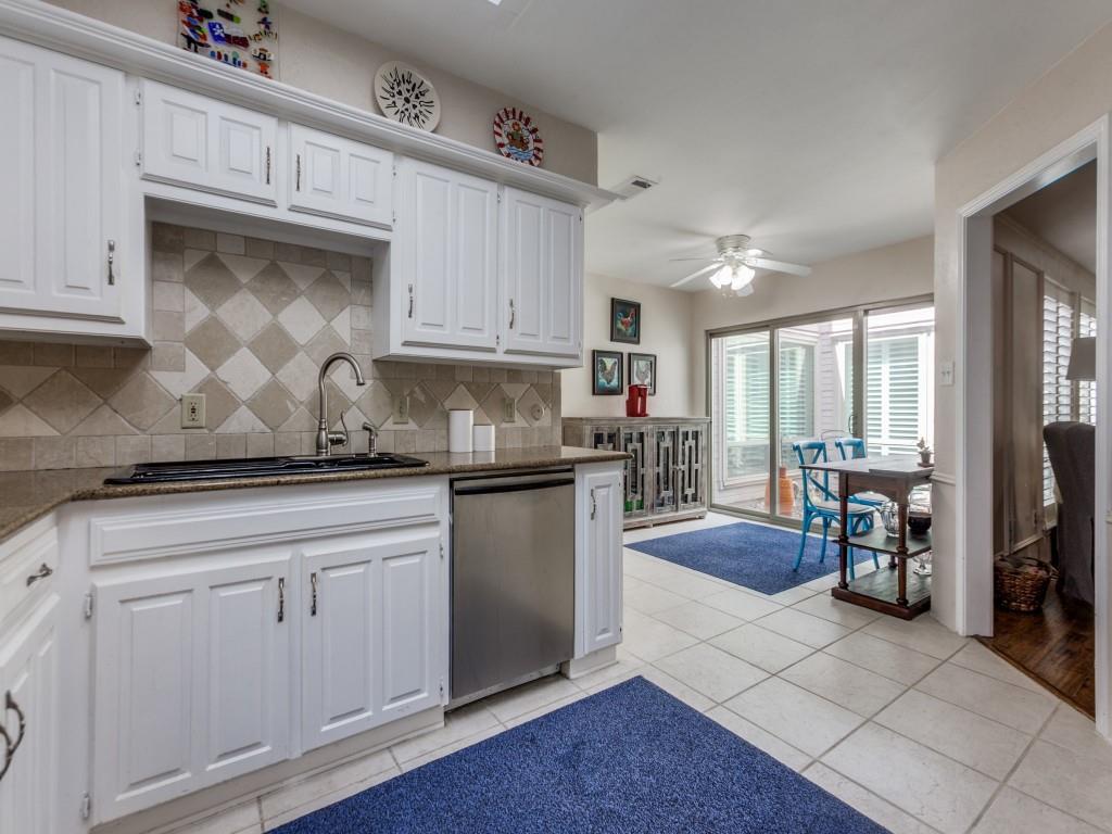 4020 Morman Lane Addison, TX 75001 - Photo 10 of 25 a kitchen with cabinets and outdoor view