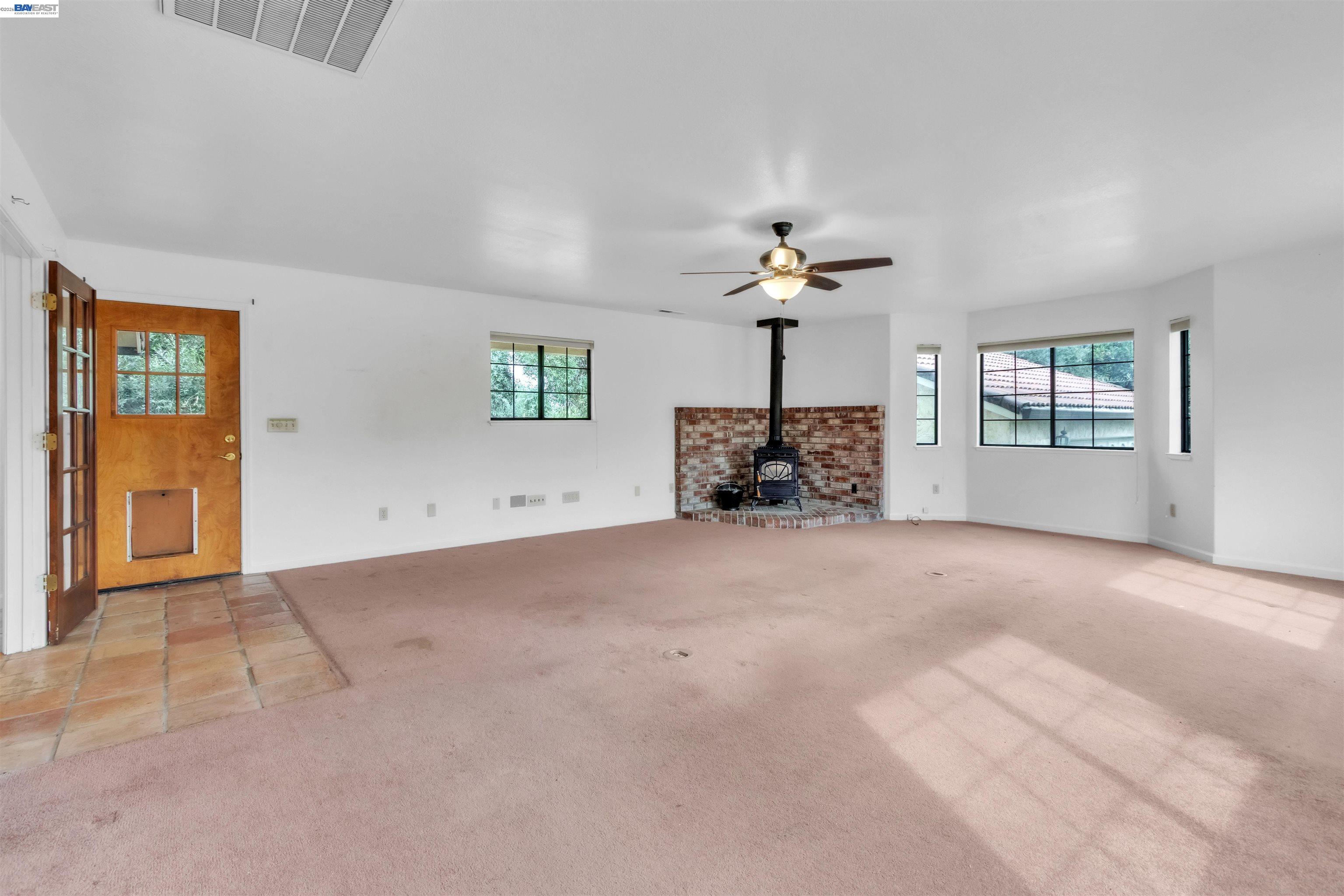 3665 Illinois Avenue Corning, CA 96021 - Photo 28 of 54 a view of empty room with a fireplace