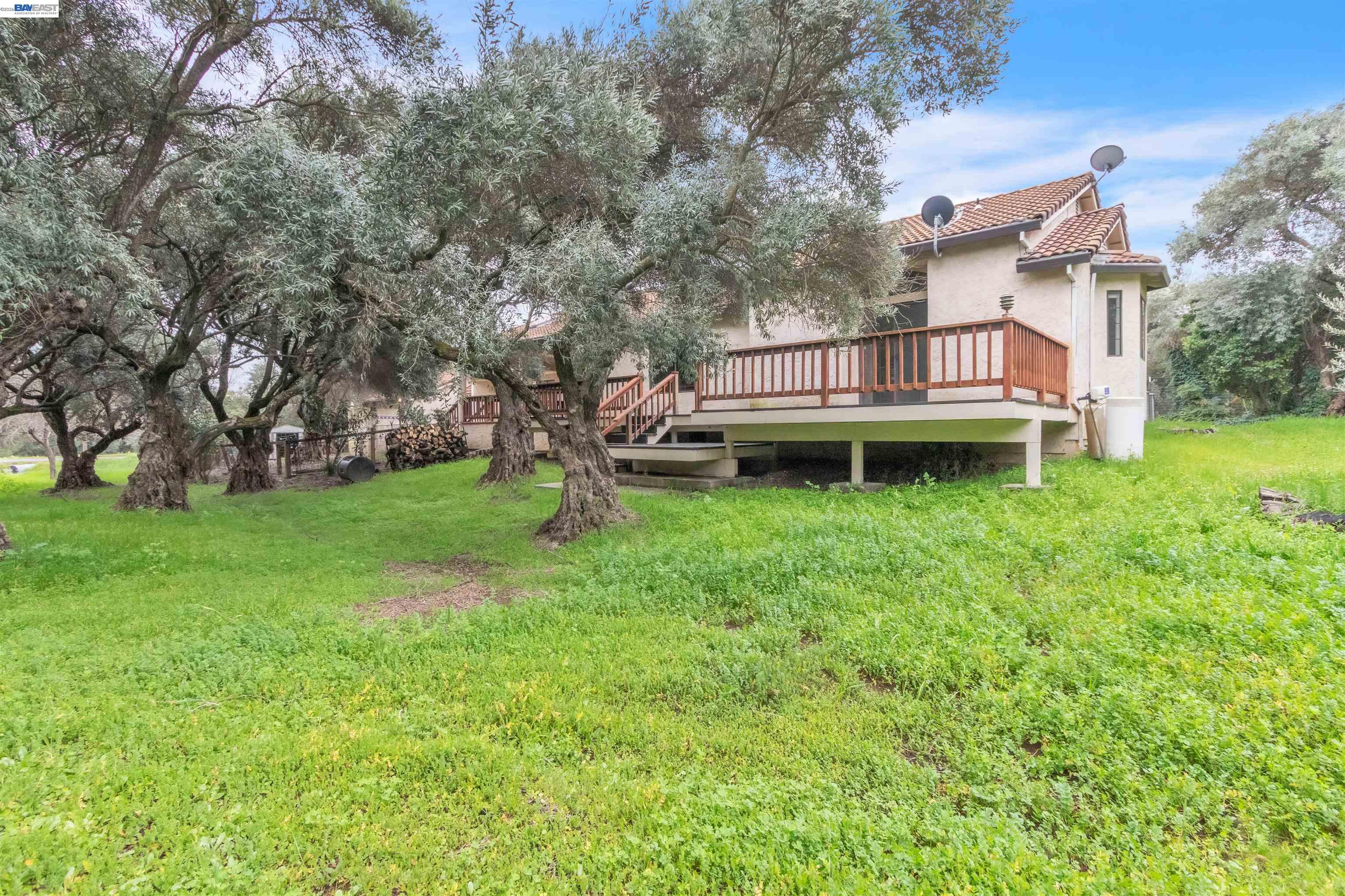 3665 Illinois Avenue Corning, CA 96021 - Photo 50 of 54 a backyard of a house with table and chairs
