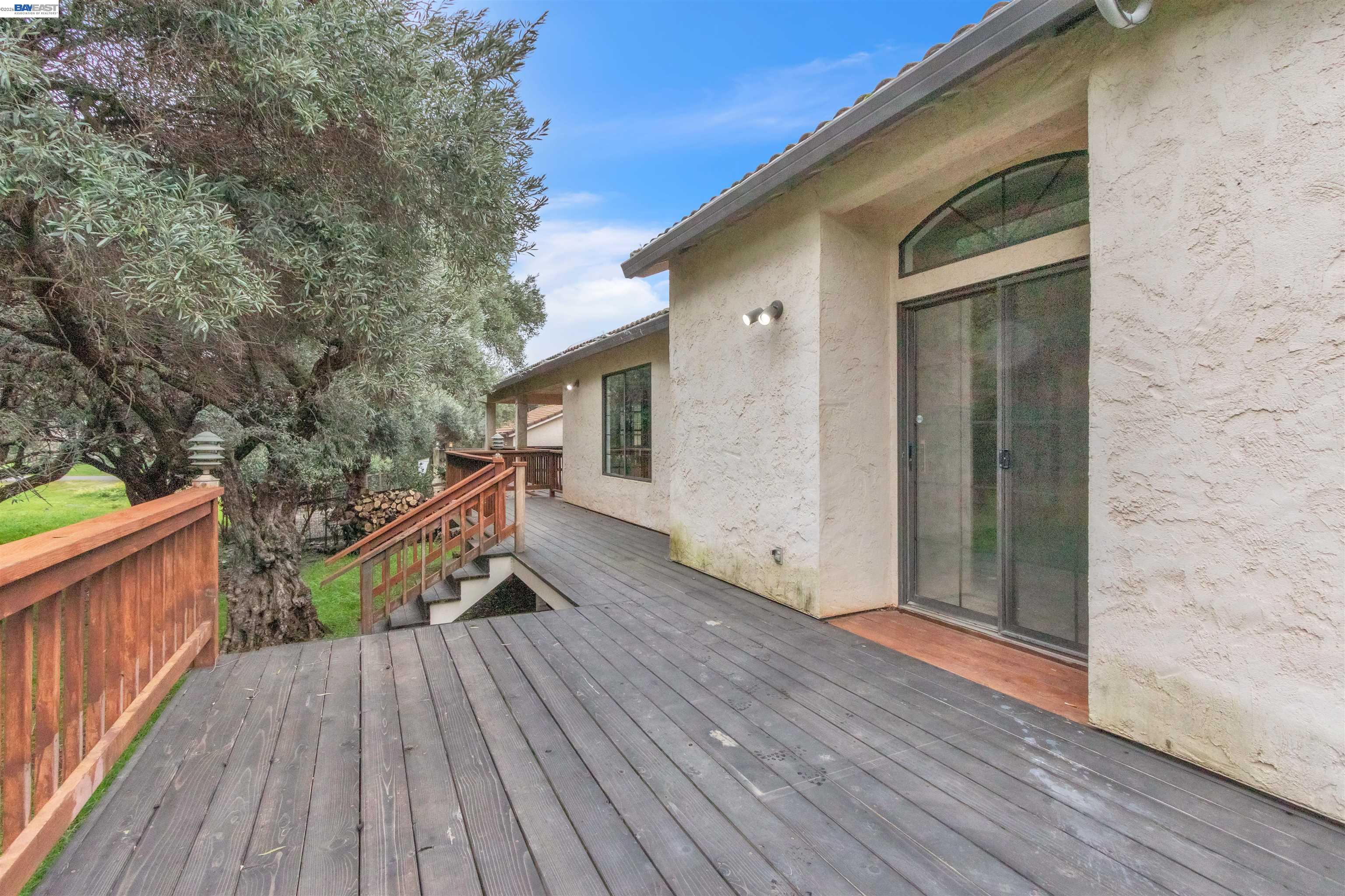 3665 Illinois Avenue Corning, CA 96021 - Photo 5 of 54 a view of balcony with wooden floor and fence