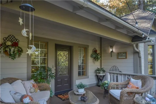 a view of a two chairs in the deck