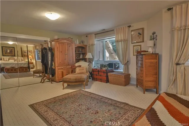 a large bathroom with a glass door shower and sink