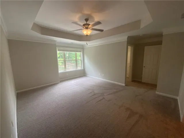 a view of a hallway with windows