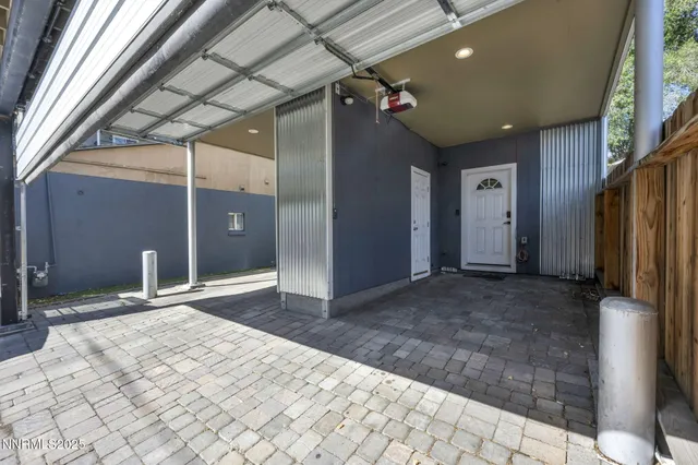 a kitchen with stainless steel appliances granite countertop refrigerator sink and cabinets