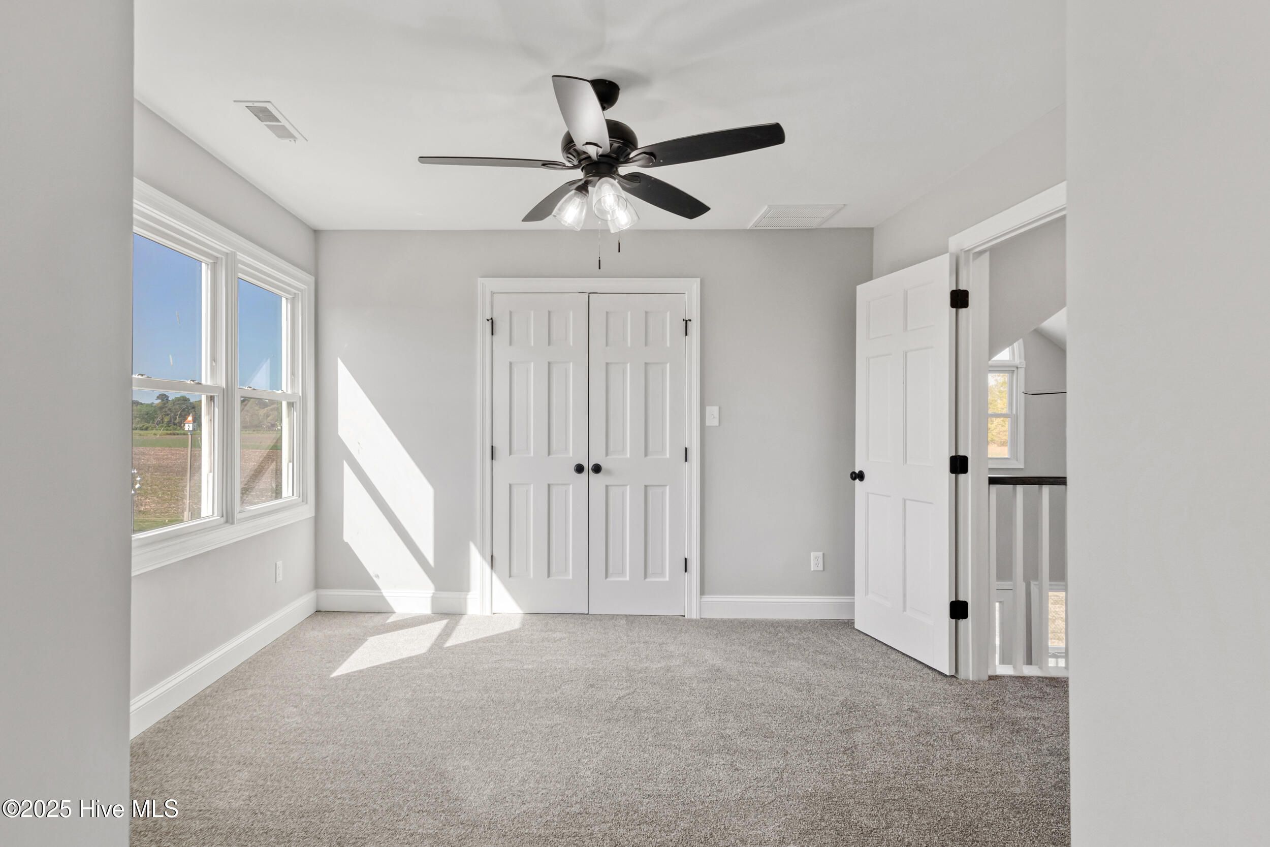 169 Baxter Estates Road Currituck, NC 27929 - Photo 31 of 39 Large 2nd floor guest bedroom
