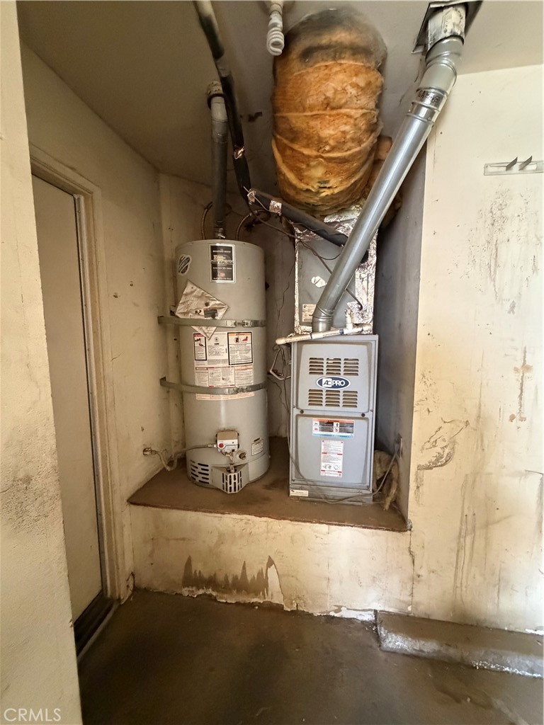 24677 Rugby Lane Moreno Valley, CA 92551 - Photo 33 of 43 Water heater in garage