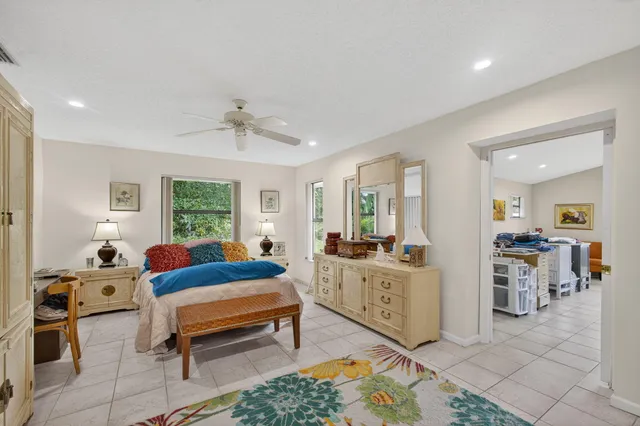 a living room with fireplace furniture and a flat screen tv