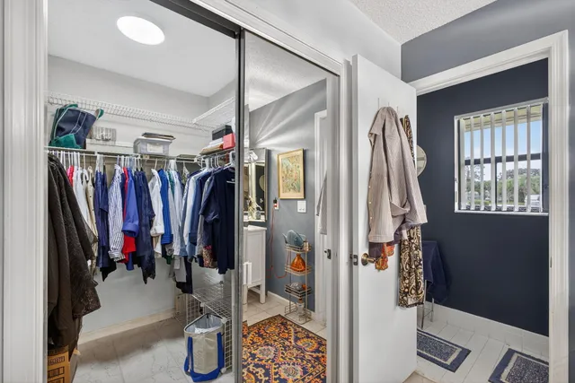 a workspace with furniture and a window