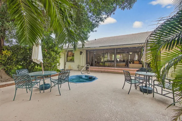a view of a house with a swimming pool