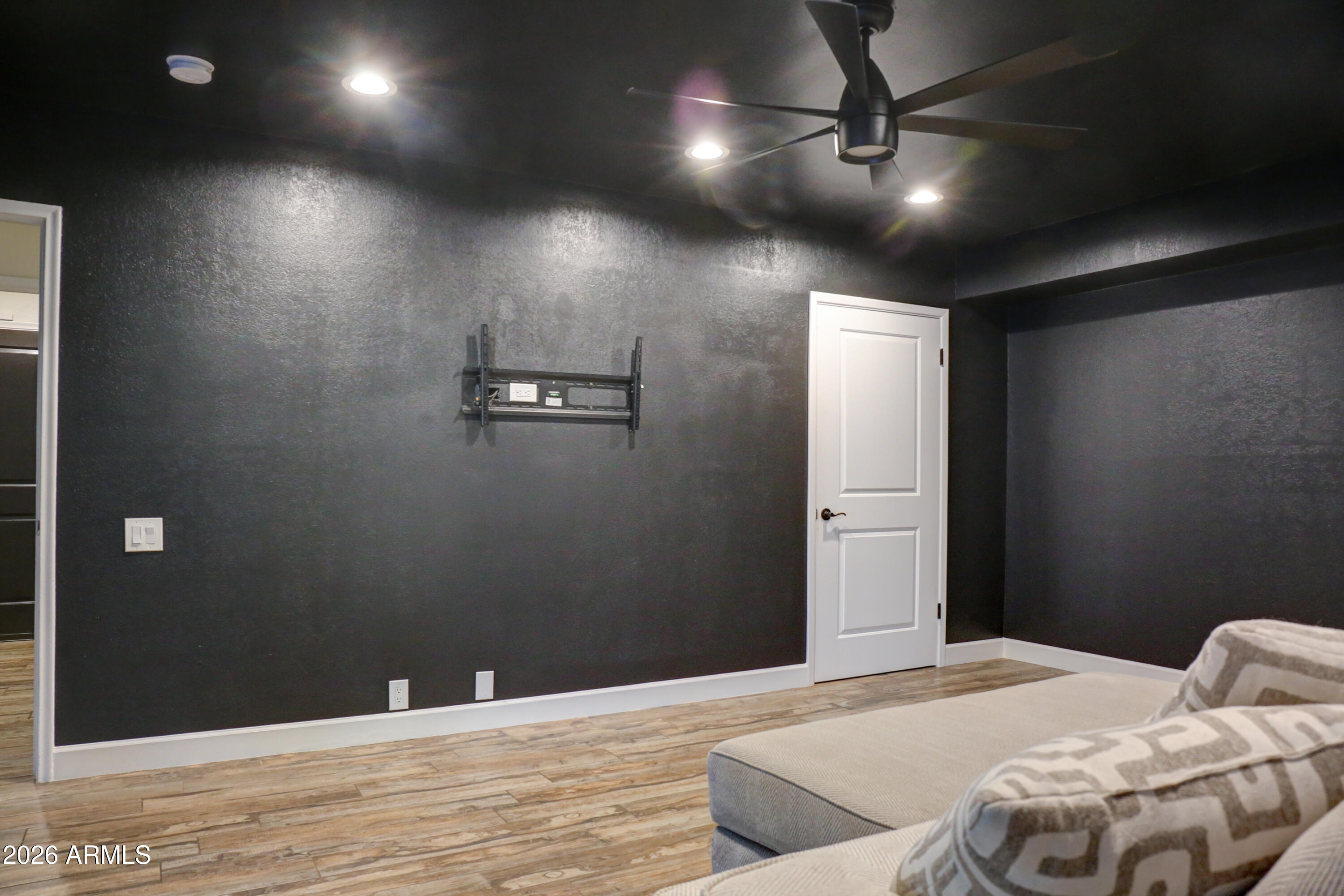 2016 East State Avenue Phoenix, AZ 85020 - Photo 22 of 42 a bedroom with a bed and a chandelier