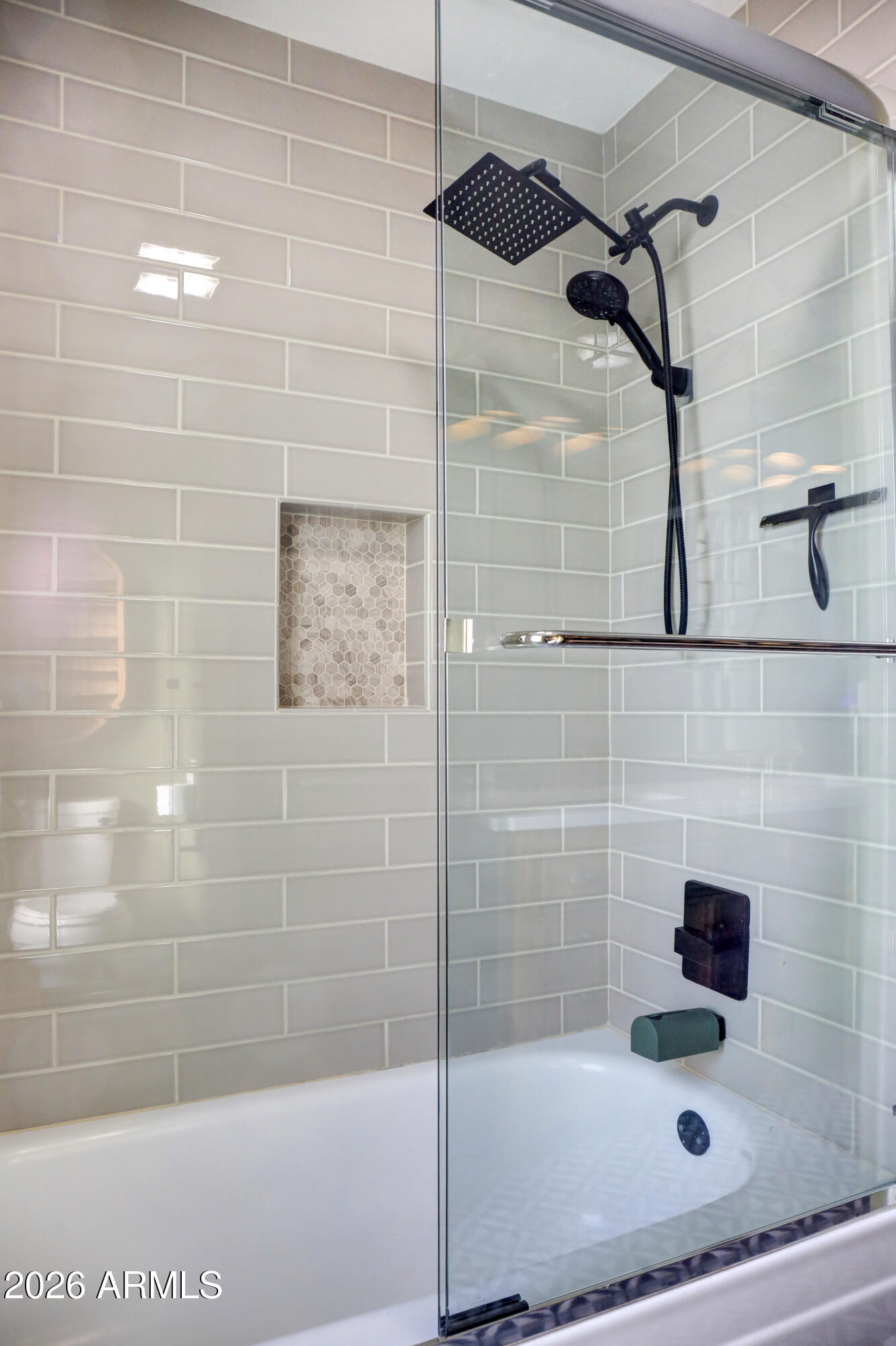 2016 East State Avenue Phoenix, AZ 85020 - Photo 35 of 42 a bathroom with a shower and mirror