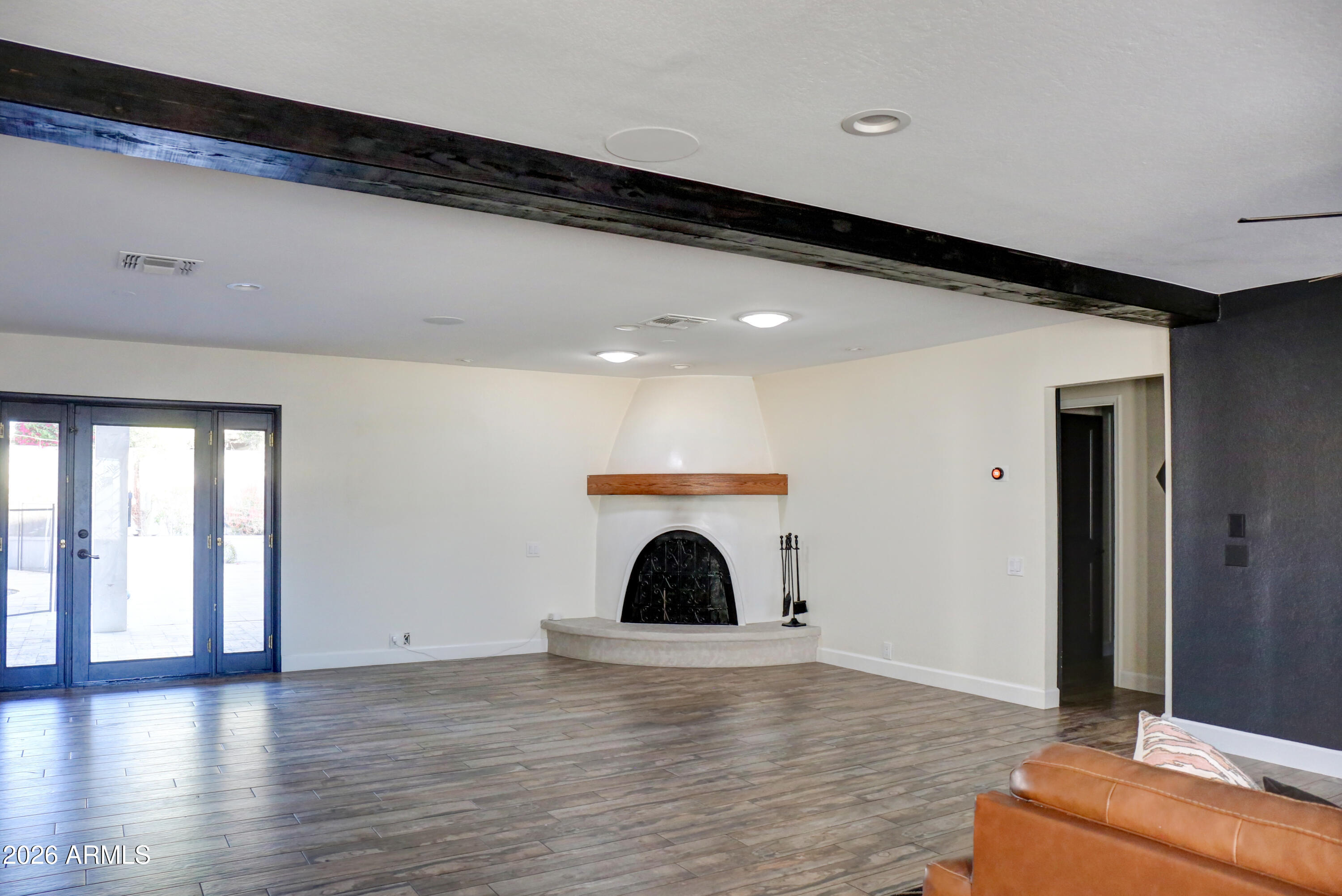 2016 East State Avenue Phoenix, AZ 85020 - Photo 7 of 42 a view of a big room with wooden floor and windows