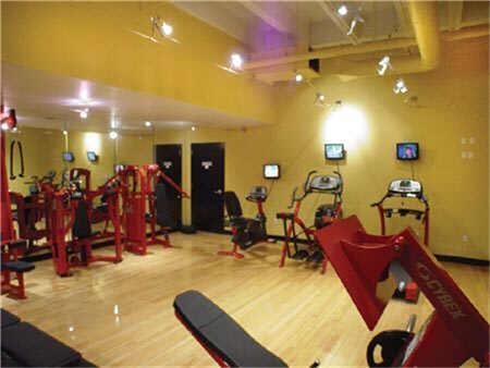 705 Main Street, Unit 315 Houston, TX 77002 - Photo 12 of 16 a gym room with lots of gym equipment