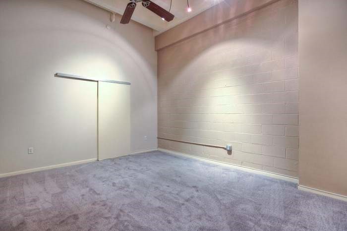 705 Main Street, Unit 315 Houston, TX 77002 - Photo 6 of 16 an empty room