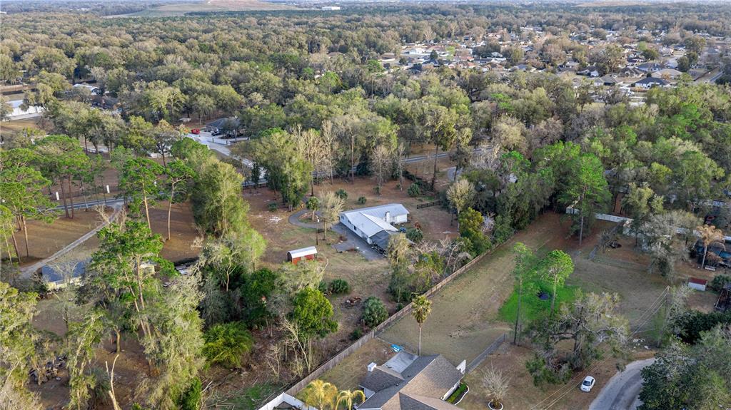 5100 Southeast 44th Avenue Road Ocala, FL 34480 - Photo 13 of 41 an aerial view of residential house with outdoor space
