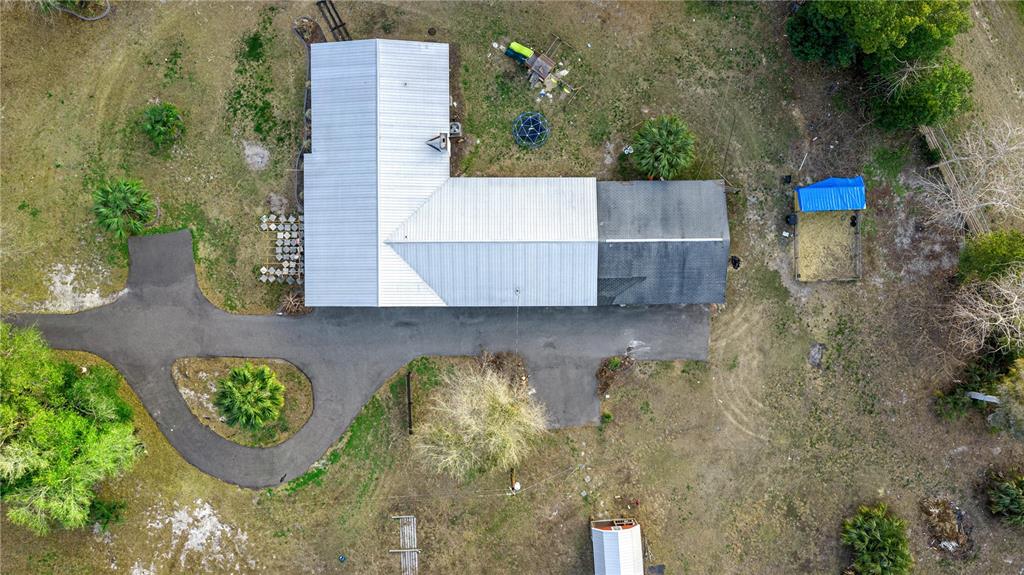 5100 Southeast 44th Avenue Road Ocala, FL 34480 - Photo 14 of 41 view of house with outdoor space