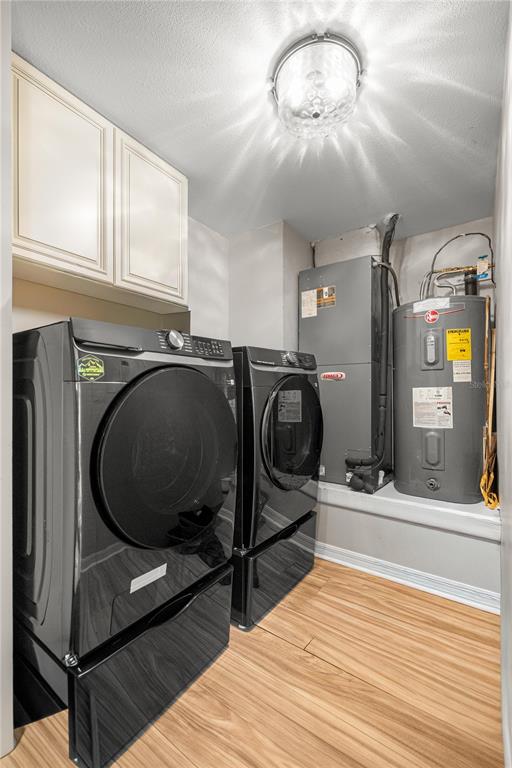 5100 Southeast 44th Avenue Road Ocala, FL 34480 - Photo 15 of 41 a living room with stainless steel appliances furniture a rug and a wooden floor