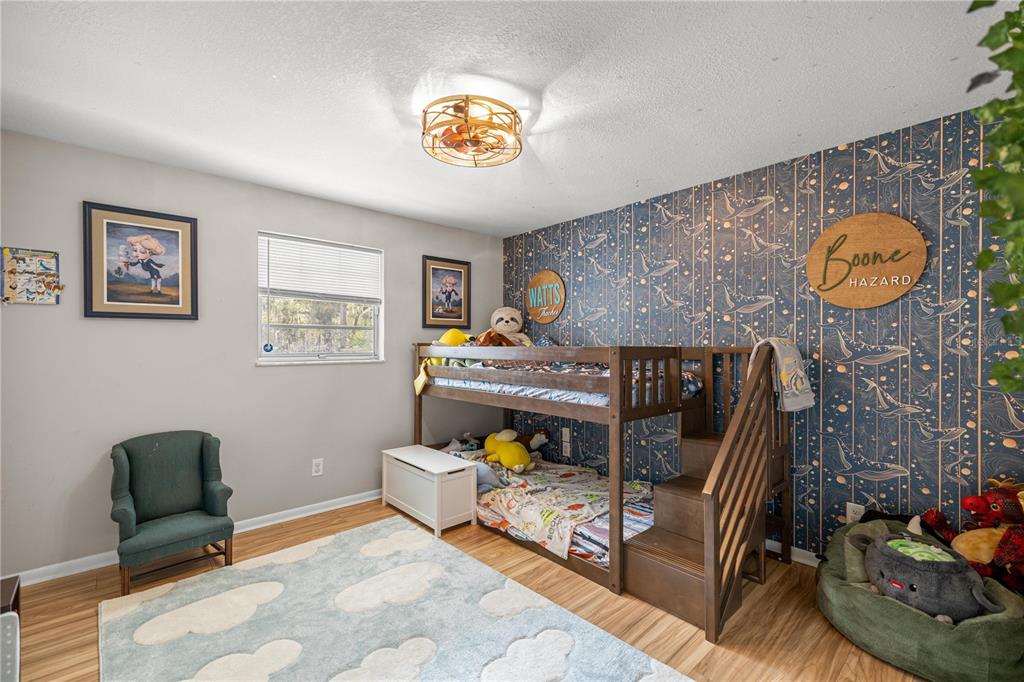 5100 Southeast 44th Avenue Road Ocala, FL 34480 - Photo 26 of 41 a living room with furniture and a table